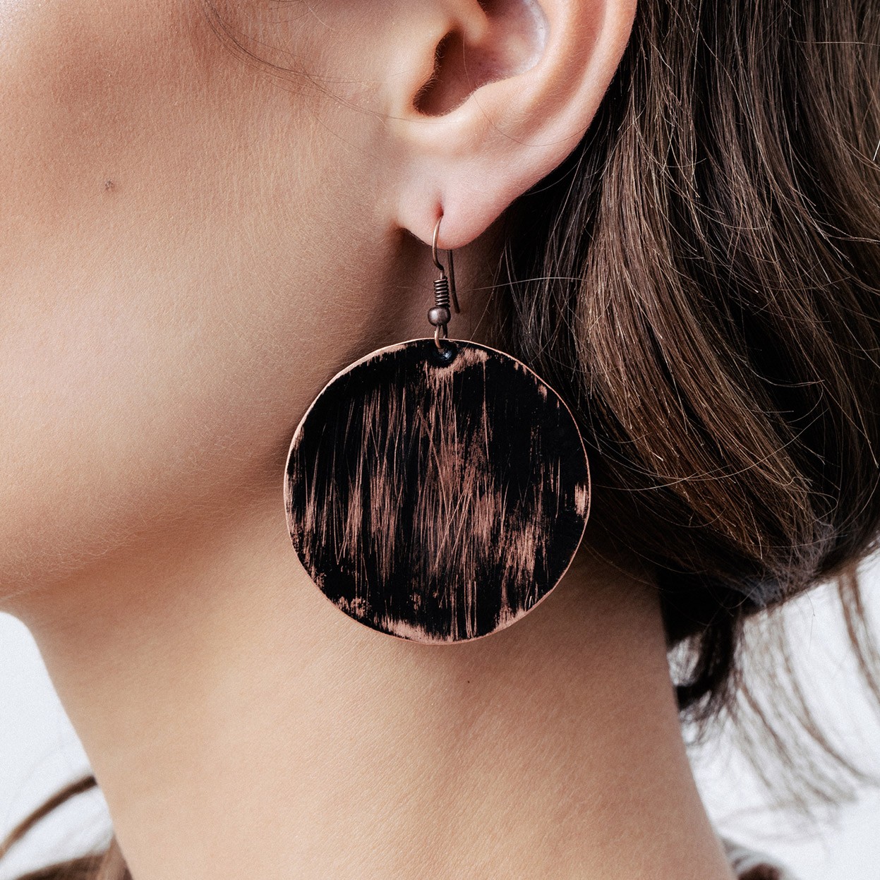 Copper earrings with leopard print