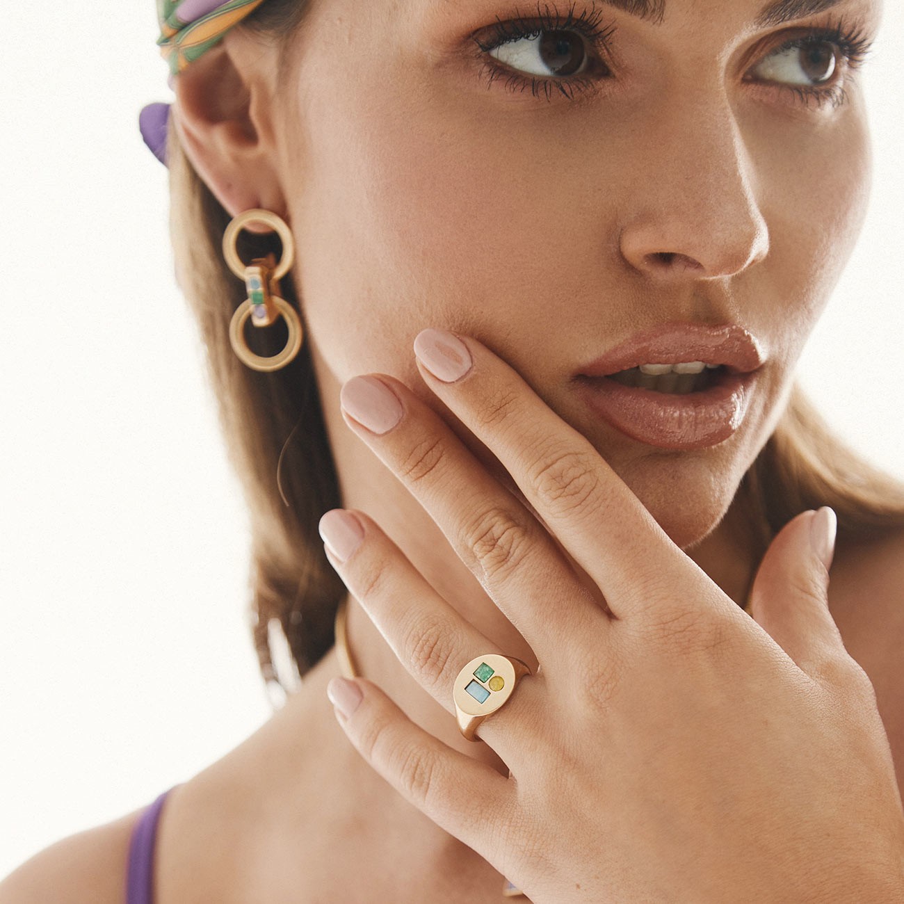 Signet ring with a colorful stones