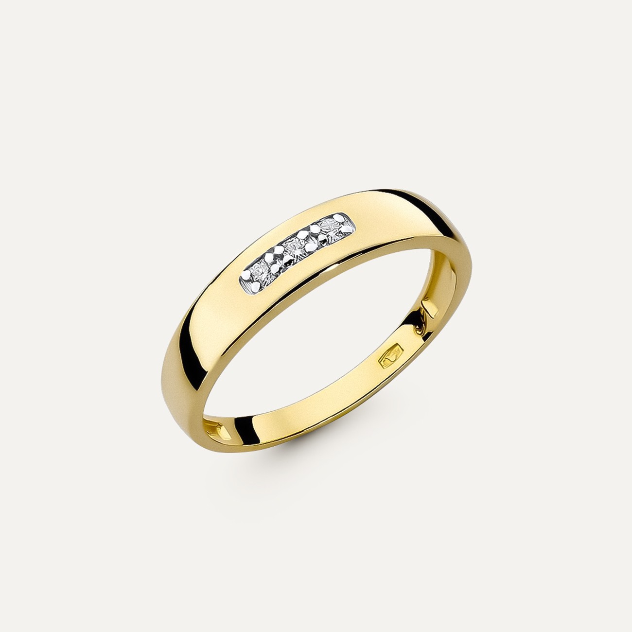 Złota obrączka pierścionek brylant