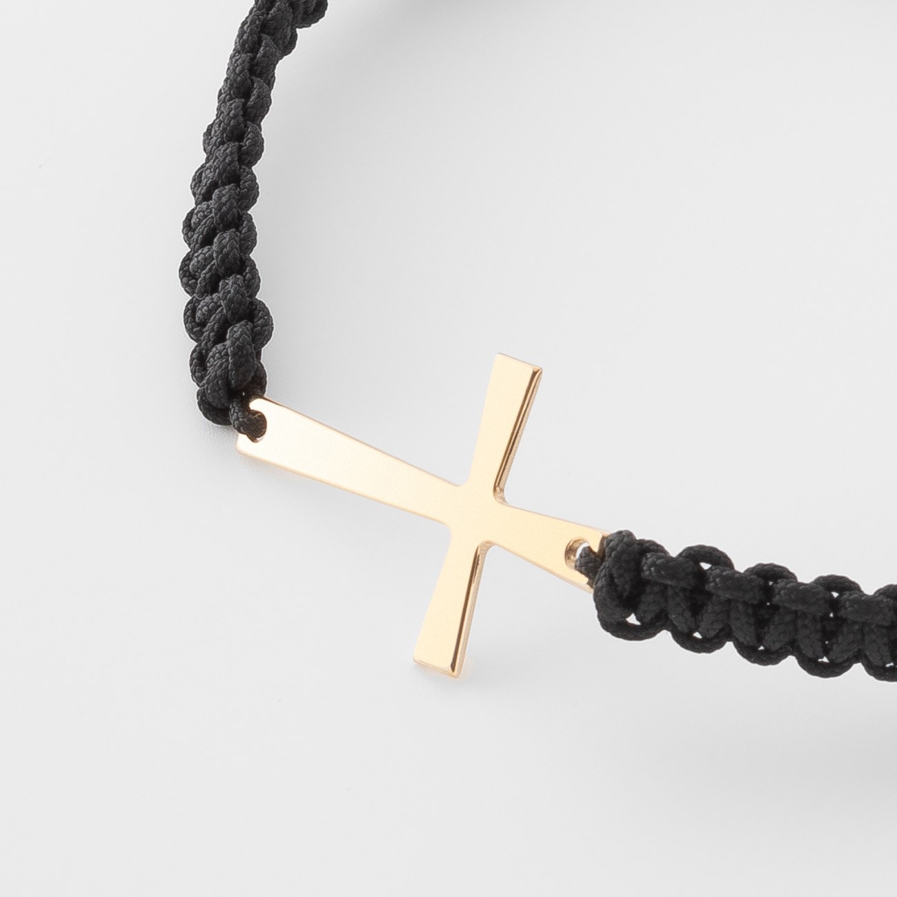 Cord crucifix bracelet