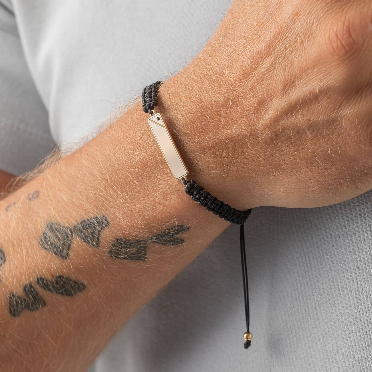 Cord bracelet rectangular tag with black crystal