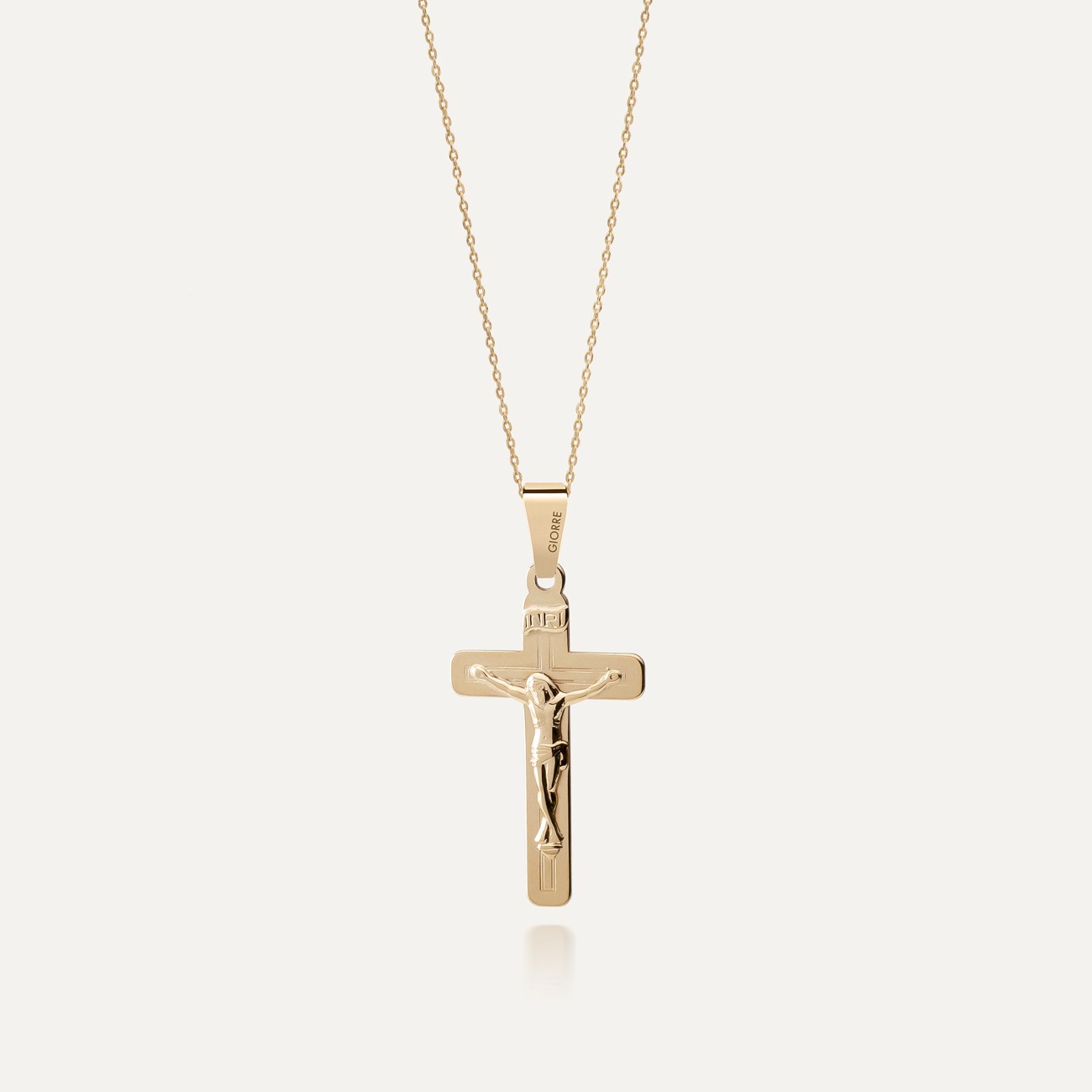 Gold necklace with a cross