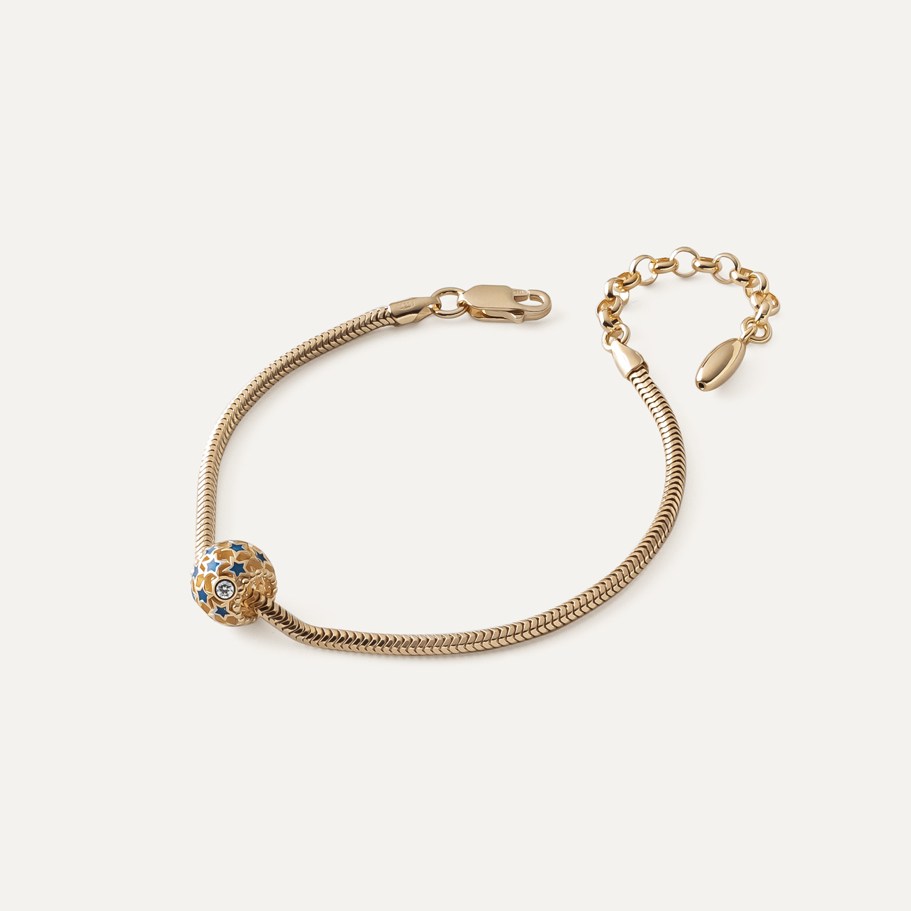 Slim bracelet with filigree bead with blue stars, Sterling Silver 925, gold plated