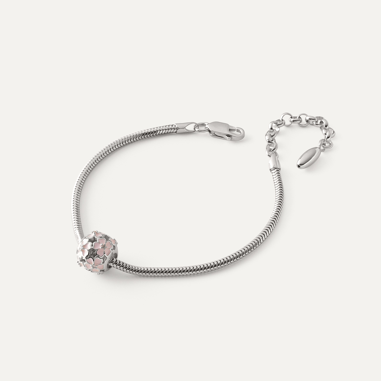 Bransoletka Slim z ażurową kulką z różowymi kwiatami typu beads, srebro 925 pokryte platyną