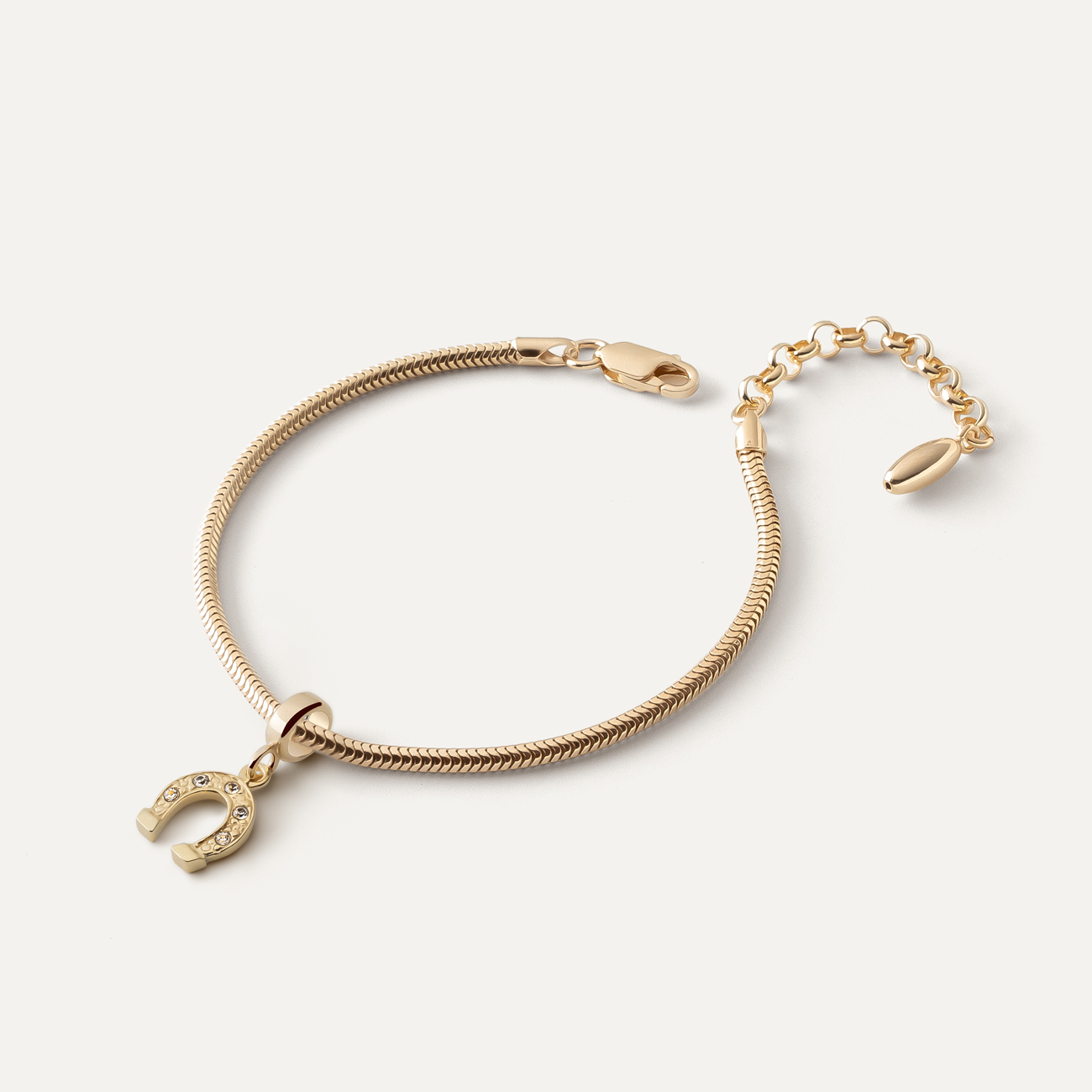 Bransoletka Slim z zawieszką typu beads – podkowa z cyrkoniami, srebro 925 w złotym pokryciu