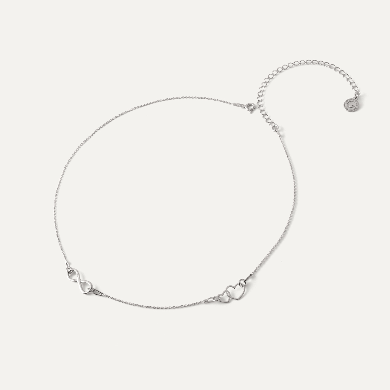 Delicate necklace with two hearts and infinity, sterling silver 925 plated with platinum