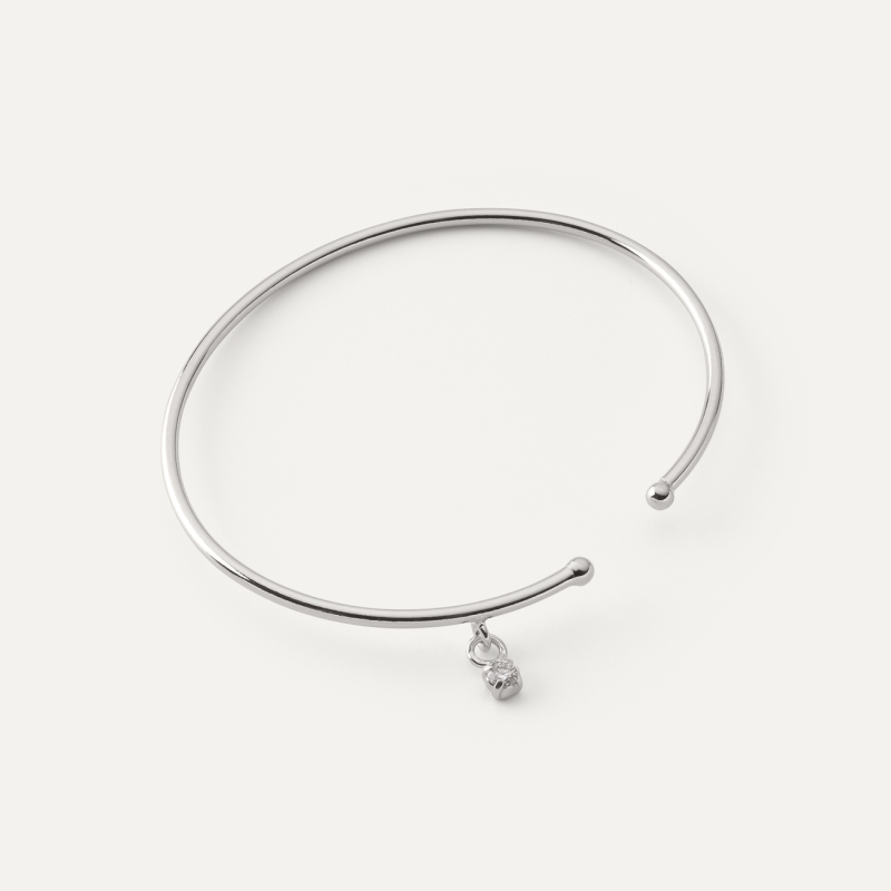 Delikatna sztywna bransoletka z podwieszaną z cyrkonią w pokryciu platyną