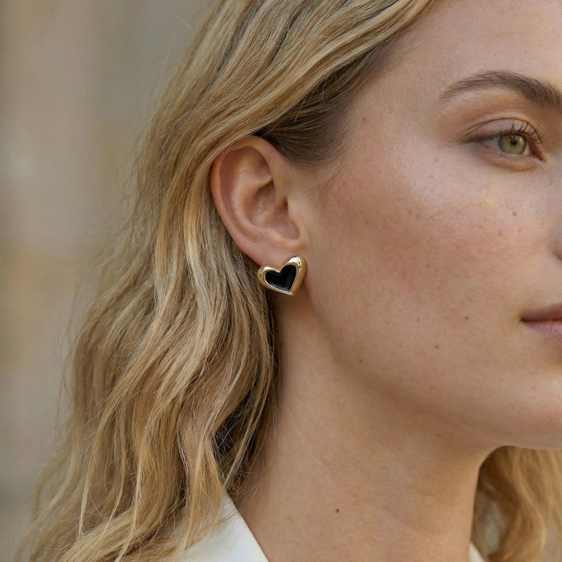 Schmuckset mit Herzen aus schwarzem Harz, 925er Silber mit Vergoldung                                    