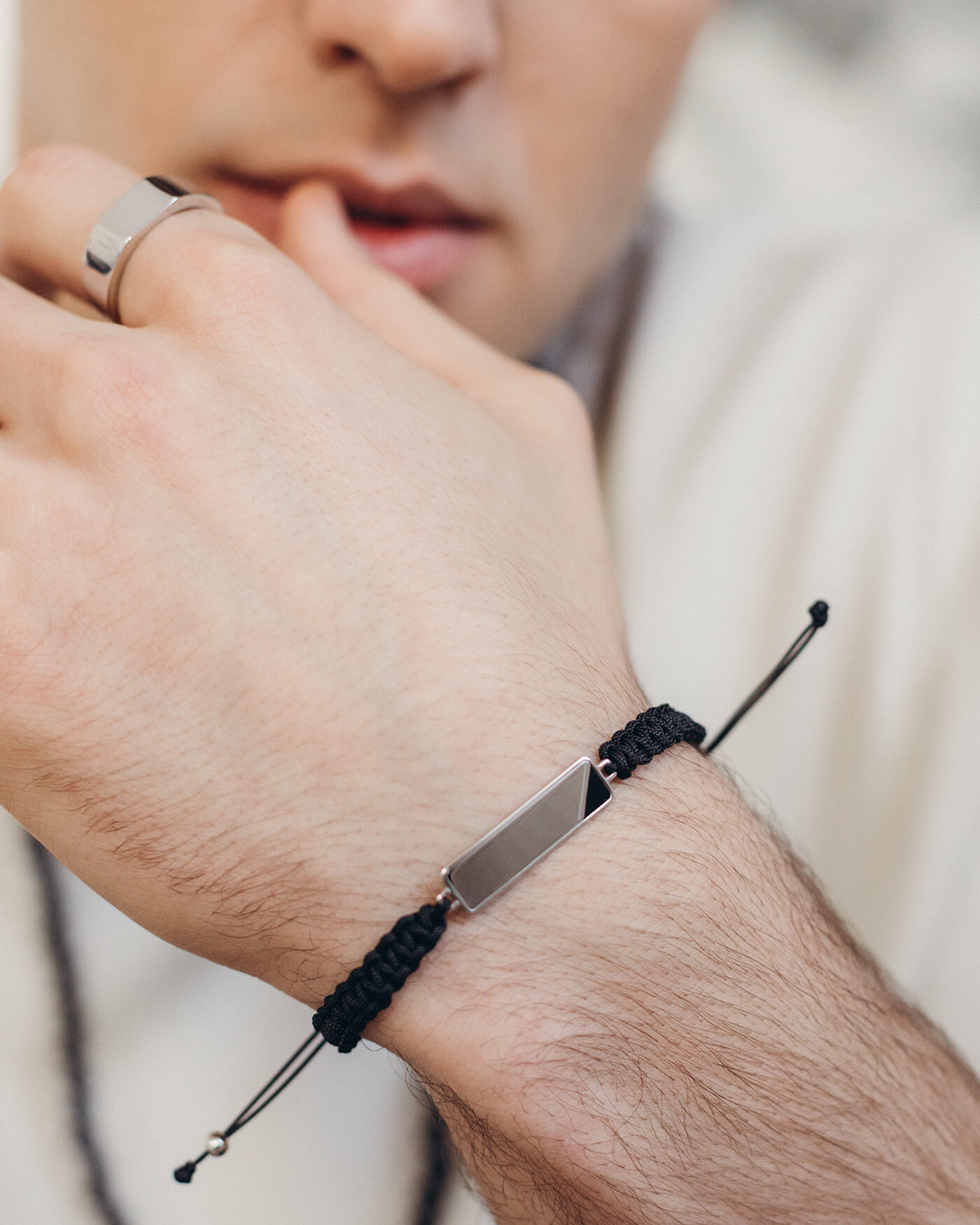 Giorre men’s jewelry – silver band ring and cord bracelet